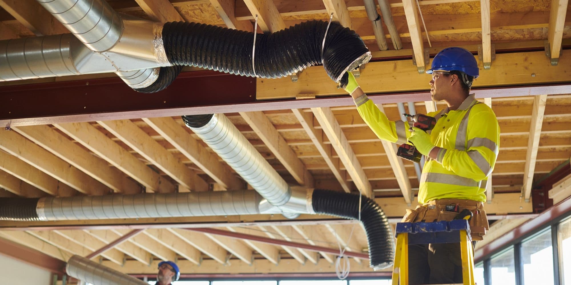 Team installing new HVAC system.